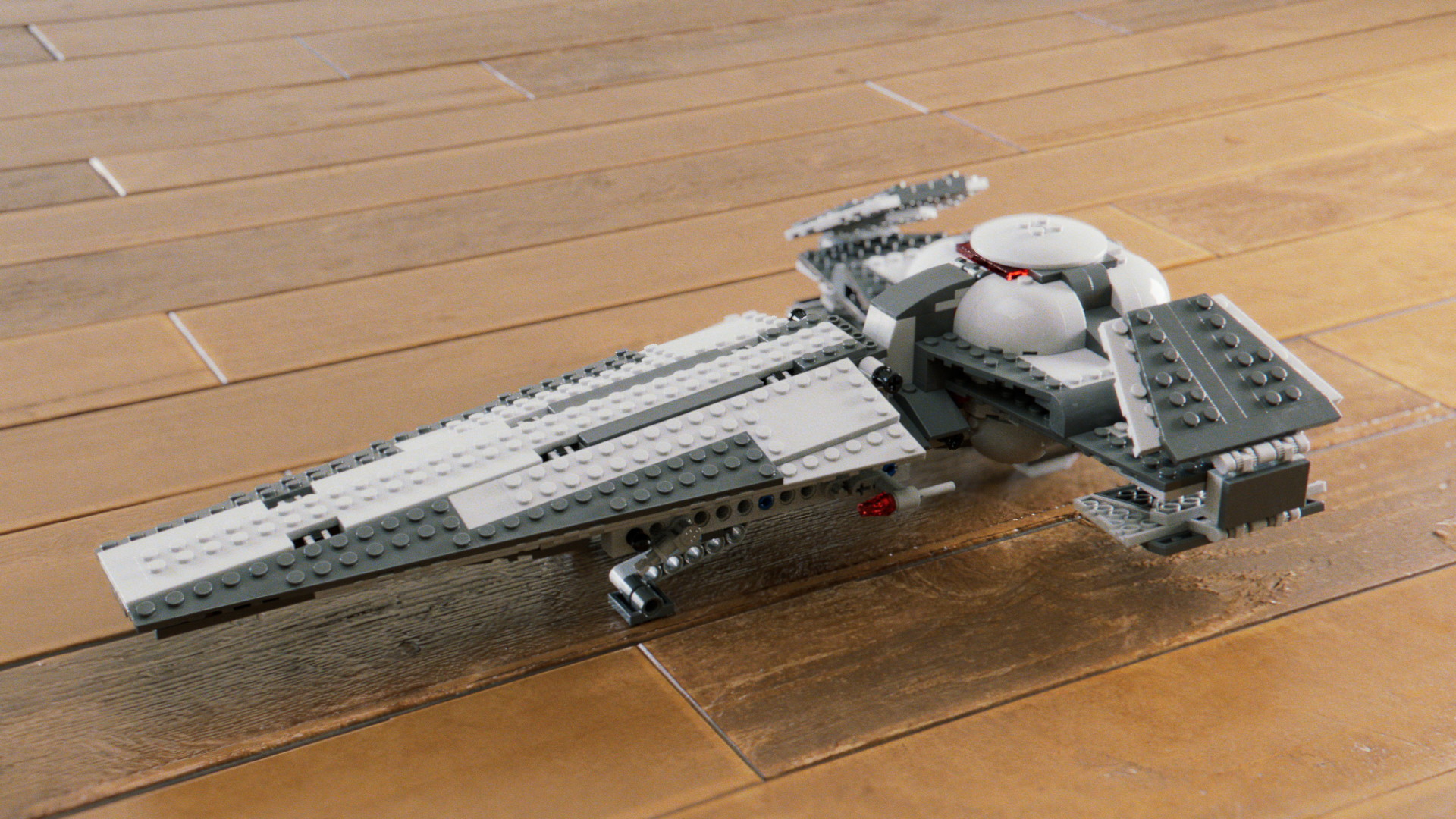 Another famous StarWars ship as a lego model. It has a form of T shape from above and much more greebly surface.