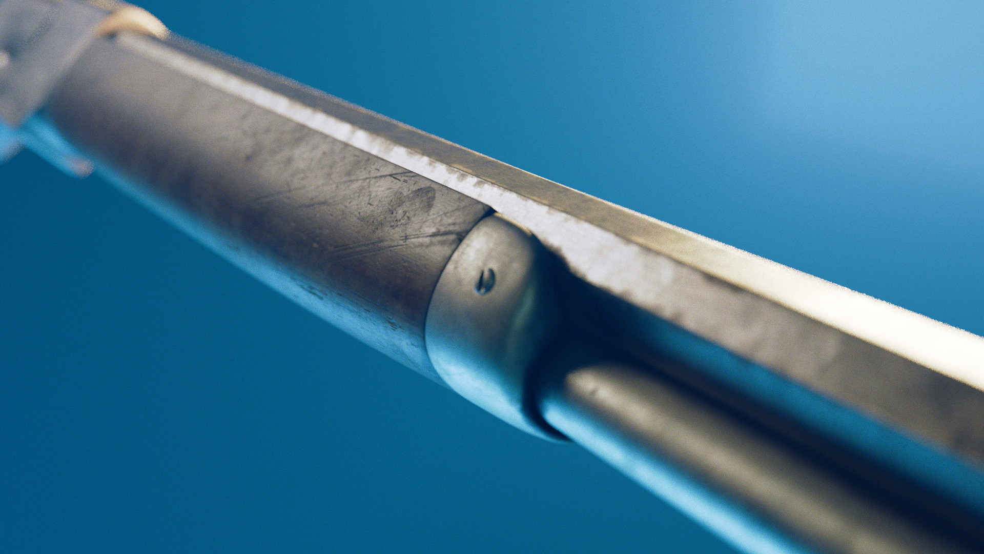 A close up of the gun barrel where we can notice all the details on the wood like scracthes and smudges.