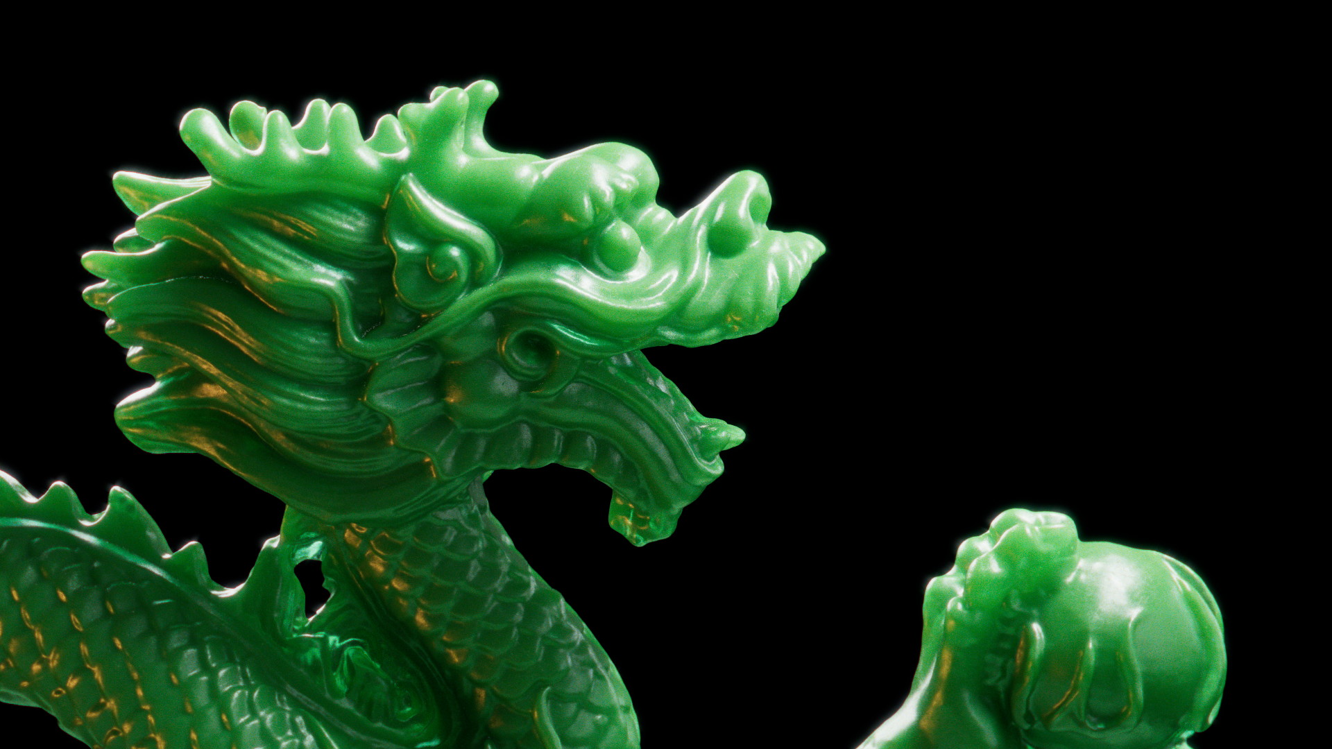 A close-up of a asiatic dragon statue. It feel like some kind of plastic and has a refeshingly green color.