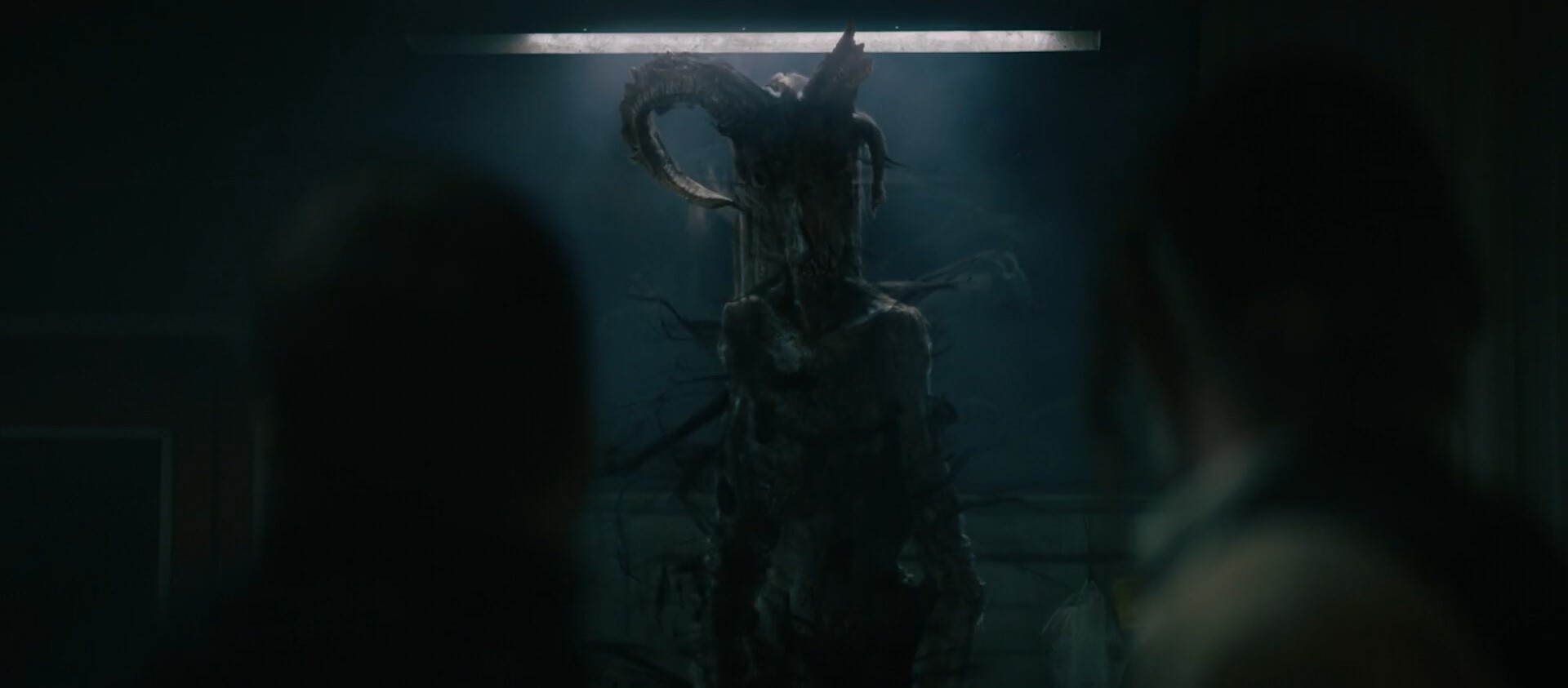 Starring at the 2 men she was there, surronded by a mysterious mist of darkness. Sundenly the mist moved and she disapeared, taking with her the light of the room as the neon exploded.